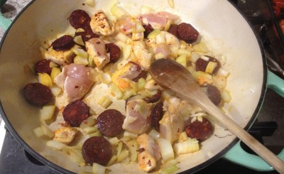 frying chicken and chorizo
