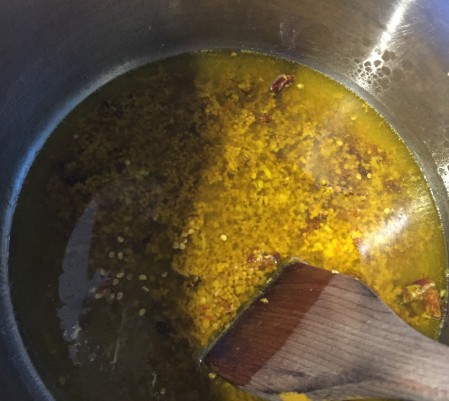 fry spices in oil