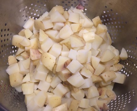 cube and parboil potatoes