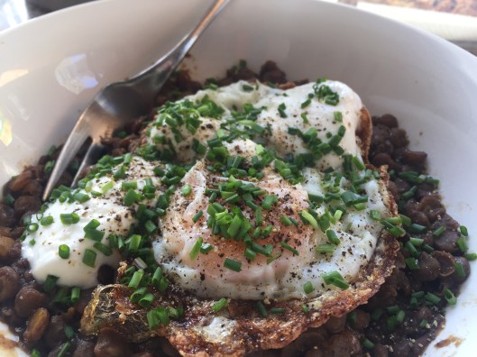 left over lentils with a crispy egg and chives