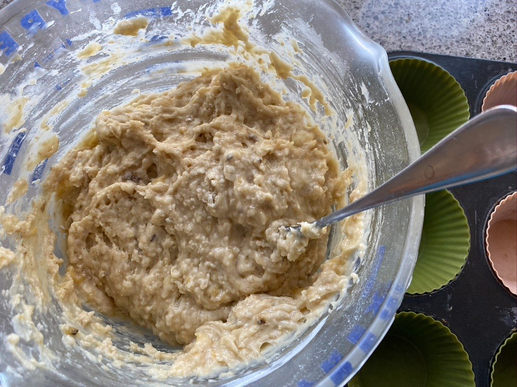 spoon batter into lined muffin cups